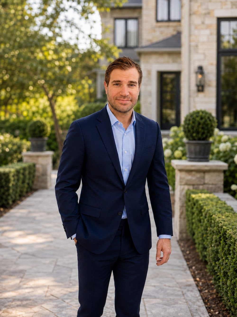 Matt Caiola on the walkway of a Fairfield County estate